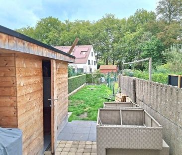 Rijwoning met tuin met uitweg - Photo 4