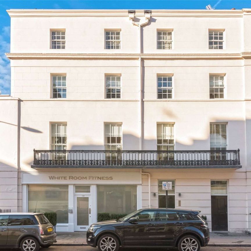 A luxuriously appointed two bedroom apartment in this converted period building in Belgravia benefitting from wood flooring and contemporary style furnishing. - Photo 1