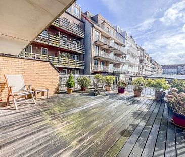 Aangenaam appartement met twee slaapkamers met een groot zuidgericht terras van 30m² gelegen in de Bayauxlaan. - Foto 1