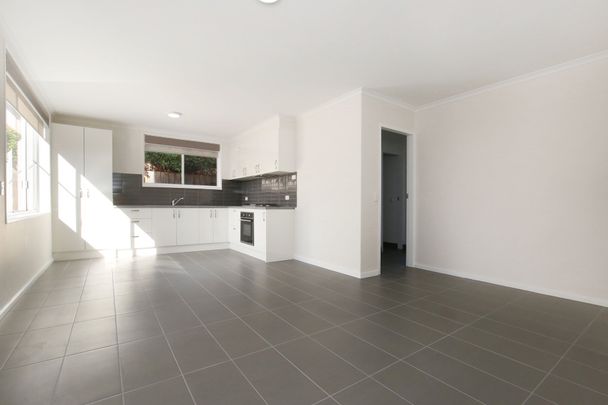 TWO BEDROOM UNIT CLOSE TO THE ACTION! - Photo 1