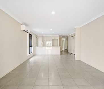 Spacious 4-Bedroom Family Home in Prime Griffin Location - Photo 4