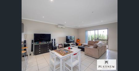 Comfortable, Low Maintenance Living in a Handy Location - Photo 3