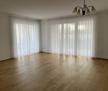 Moderne Neubauwohnung mit Loggia, Terrasse und Garten – inkl. TG-St... - Foto 1