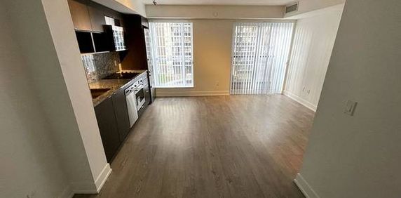 TRIDEL LUXURIOUS 1 BED CONDO PARKING INCLD STEPS TO SUBWAY - Photo 2