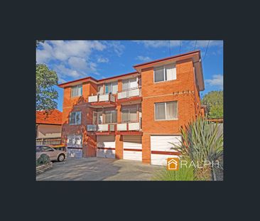 Modern 2 bedroom residence with a lock up garage - Photo 1