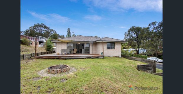 CONVENIENTLY LOCATED MODERN HOME - Photo 1