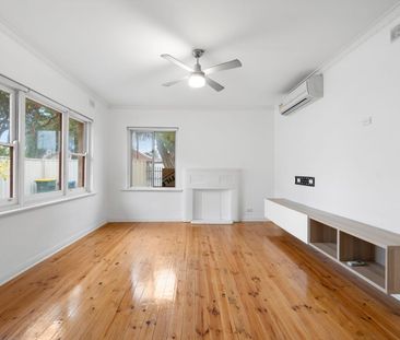 Stylishly Updated Home with Spacious Living & Modern Comforts - Photo 1