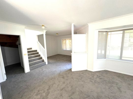 Spacious 3 Bedroom Townhouse in Fabulous Location - Photo 1