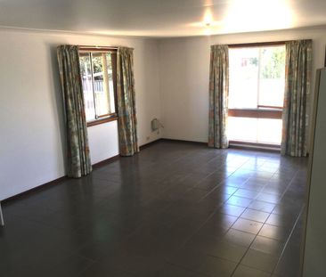 NESTLED AWAY IN A QUIET STREET - Photo 1