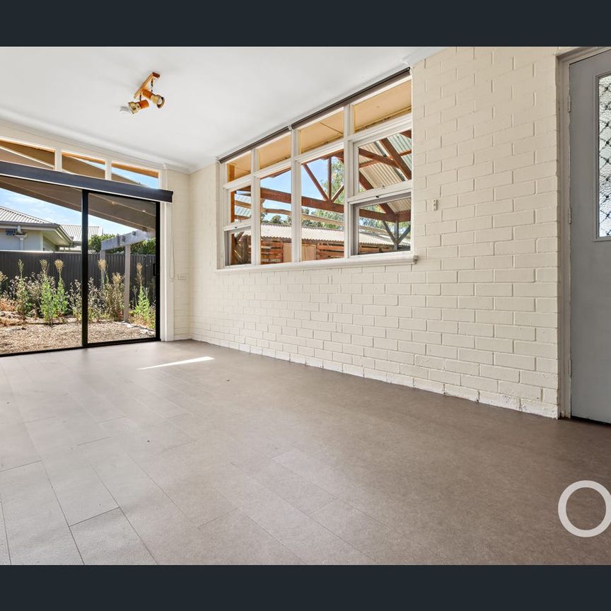 Open the door to easy living by the coast - Photo 1