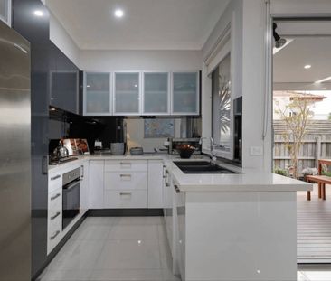 Low maintenance family living - Photo 2