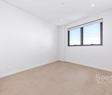 Stylish East-Facing Level 7 Corner Apartment with Abundant Natural ... - Photo 2