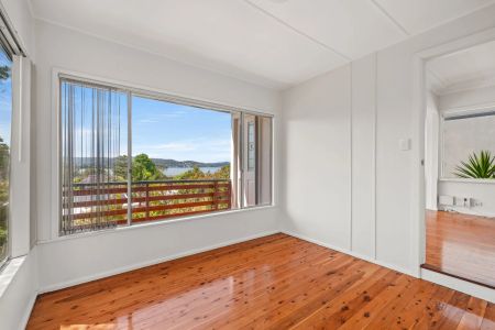 Conveniently Located Cottage with Captivating Water Views - Photo 5