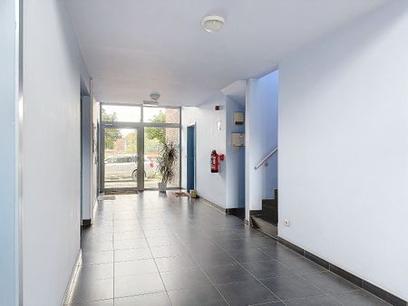 Gelijkvloers appartement met 2 slaapkamers en privétuin - Photo 3