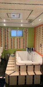 Spacious and bright renovated 3½ apartment - Photo 4