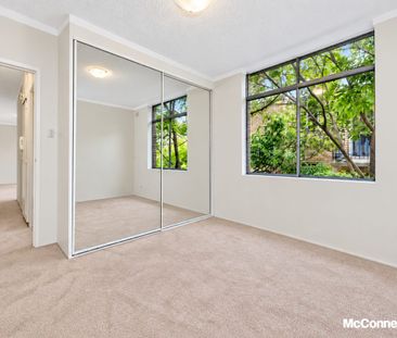 Convenient & Spacious Apartment with Newly Installed Flooring - Photo 1
