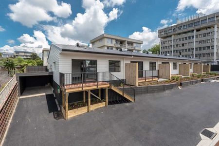 This executive two-bedroom apartment is in a fantastic central location, just a quick 5-minute walk to the CBD, along with nearby restaurants, cafes and a Woolworths supermarket. - Photo 3