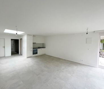 Moderne 1.0-Zimmerwohnung – Ihr Wohlfühlort im Grünen - Foto 1