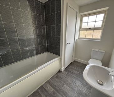 A three storey 3 bedroom mid-terraced townhouse, with an enclosed r... - Photo 1