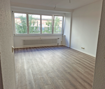 Traumwohnung im 1. OG: Modern, offen und familienfreundlich! - Foto 4