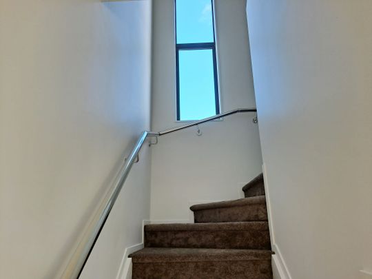 Spacious and Modern Two-Level Home in a Fantastic Location - Photo 1