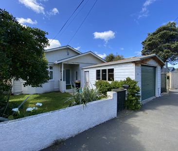 Spacious Three-Bedroom Home with Large Secure Backyard - Photo 1
