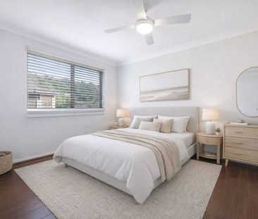 Sunlit Top Floor Coastal Retreat with Ocean Views - Photo 2