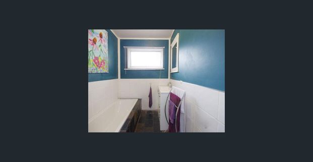 FOUR BEDROOM HOME IN THE HEART OF BELMONT - Photo 1