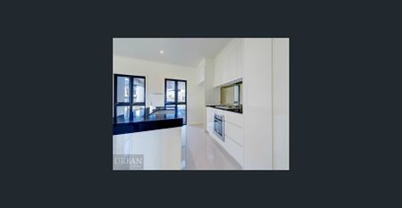 Modern 3 Bedroom Townhouse In Sought After Location - Photo 2