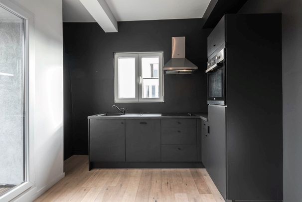 Trendy gerenoveerd 2 slaapkamer appartement recht tegenover het Boelaerpark! - Foto 1