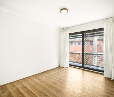 Air-Conditioned Renovated Two-Bedroom Unit with Two Balconies! - Photo 1