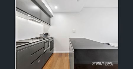 LUXURY ONE BEDROOM APARTMENT THAT OFFERS THE ULTIMATE URBAN LIVING EXPERIENCE | Furnished - Photo 3