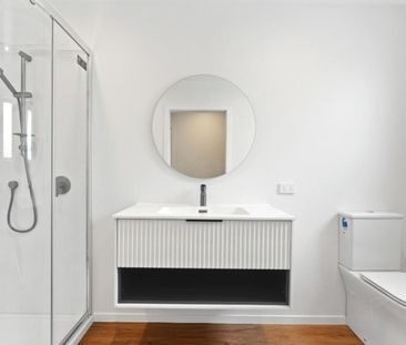 Enjoy modern living in a brand new unit - Photo 1