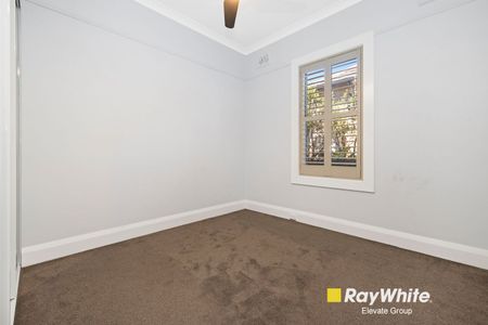 Spacious and Stylish Family Home with Sunroom and Large Backyard - Photo 5