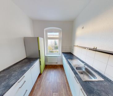 Großzügige Altbauwohnung mit Einbauküche - Foto 6