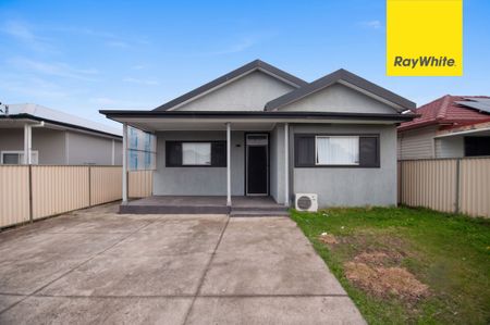FRESHLY UPDATED FOUR-BEDROOM FAMILY HOME IN A CONVENIENT LOCATION - Photo 4