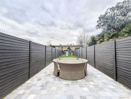 Centraal gelegen, instapklare rijwoning met stadstuin - Photo 3