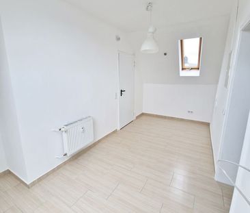 Gemütliches Apartment mit Wohnküche in zentraler Lage - Photo 2