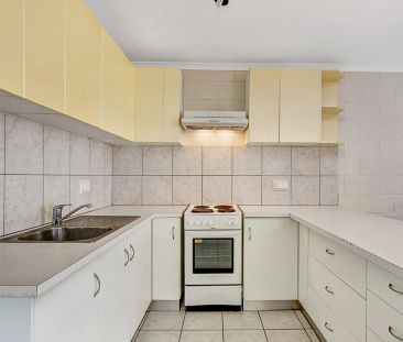 Tidy Apartment in Convenient Location! - Photo 1