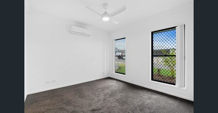 Experience Modern Luxury at its Finest: Stunning Rental Property in Logan Reserve - Photo 4