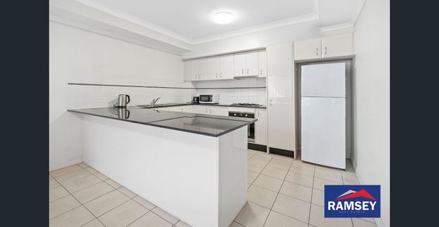 TOP FLOOR LIVING!! - Photo 1