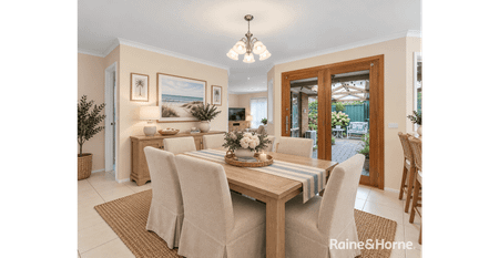 Stunning 4-Bedroom Family Home with Abundant Features! - Photo 3