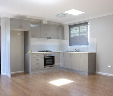 Comfortable Two-Bedroom Living in a Convenient Location - Photo 1
