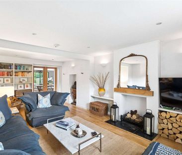 A beautifully presented and thoughtfully extended village home, off... - Photo 2