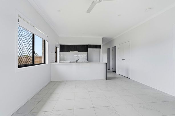 Beautiful 4-Bedroom Family Home with Modern Features - Photo 1