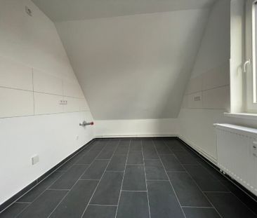 Die perfekte erste eigene Wohnung! Charmante Dachgeschosswohnung in Wolfenbüttel. - Photo 2