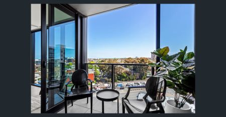 Unfurnished Two Bedroom Residence with Uninterrupted Lake and Bayside Views - Photo 4