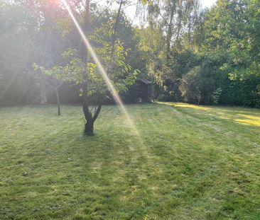 Ruime bungalow met grote tuin en garage - Photo 2