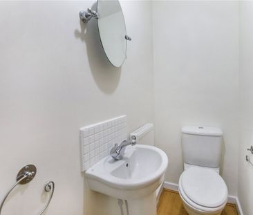 Stunning modern three bedroom townhouse in popular Olympian Court d... - Photo 1