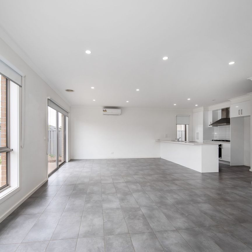Sleek Style Meets Space: Contemporary Four-Bedroom Home in Highly Sought-After Weir Views - Photo 1